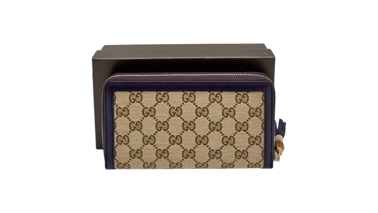 GUCCI GG CANVAS ZIPPY LONG WALLET WITH BAMBOO TASSEL