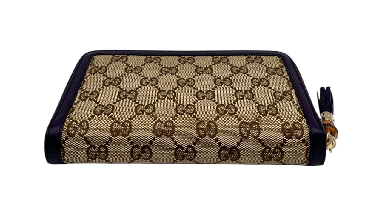 GUCCI GG CANVAS ZIPPY LONG WALLET WITH BAMBOO TASSEL