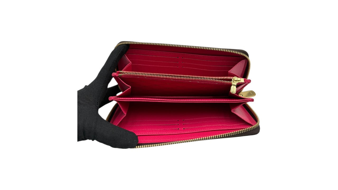 LOUIS VUITTON MONOGRAM SUMMER TRUNKS ZIPPY WALLET