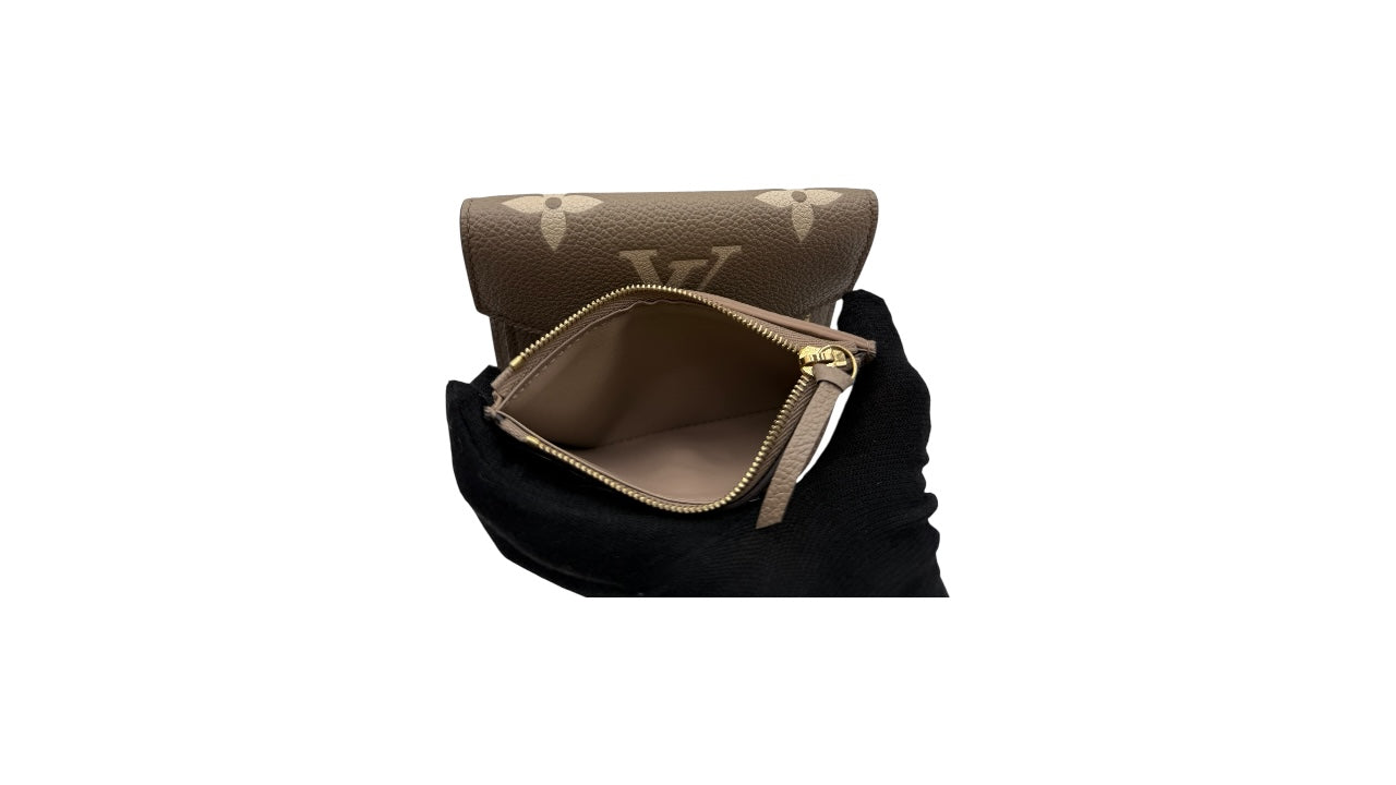 LOUIS VUITTON VICTORINE WALLET TURTLE DOVE