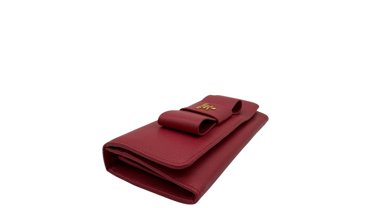 PRADA SAFFIANO LEATHER BOW CONTINENTAL FLAP WALLET PINK PEONIA