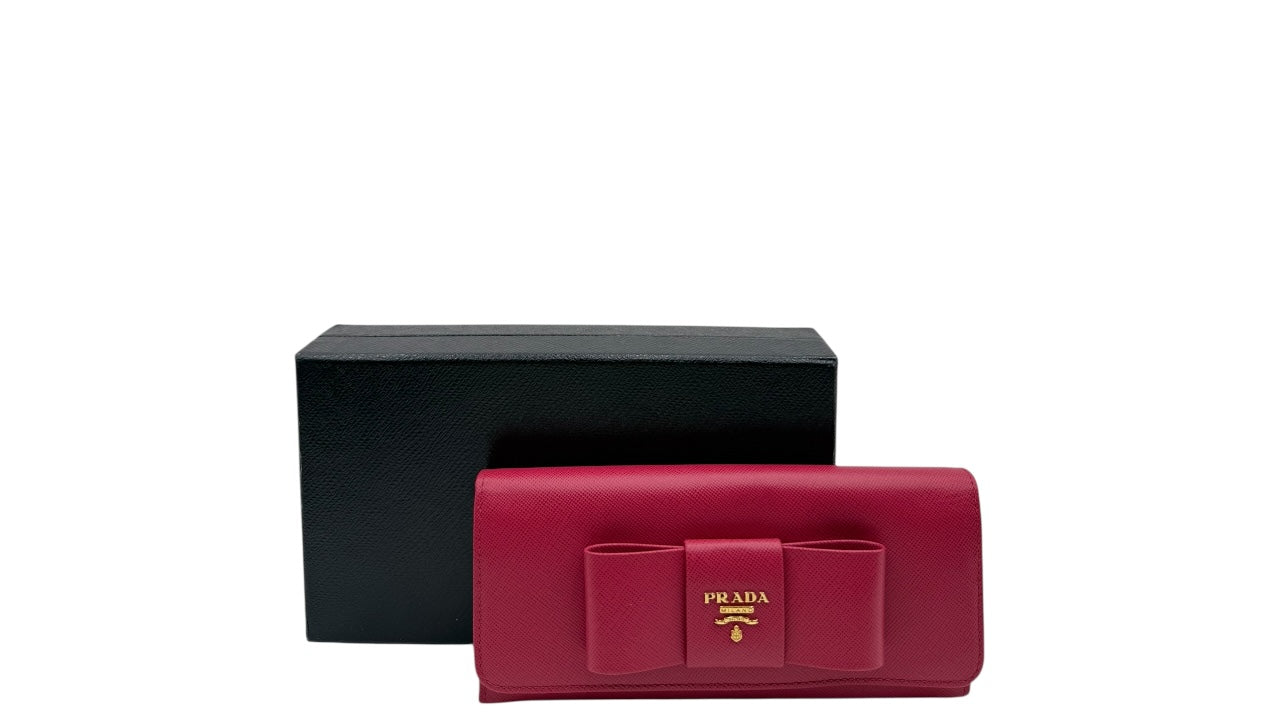 PRADA SAFFIANO LEATHER BOW CONTINENTAL FLAP WALLET PINK PEONIA
