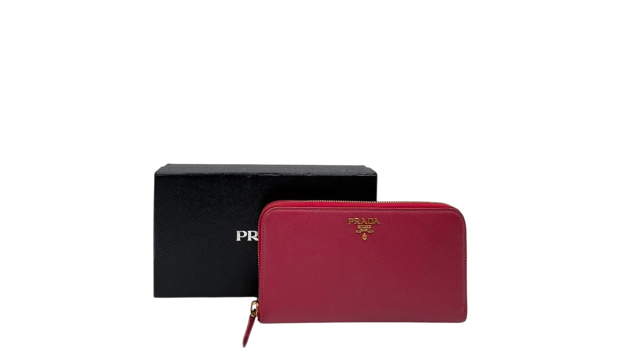 PRADA SAFFIANO LEATHER ZIPPY WALLET IN DEEP PINK