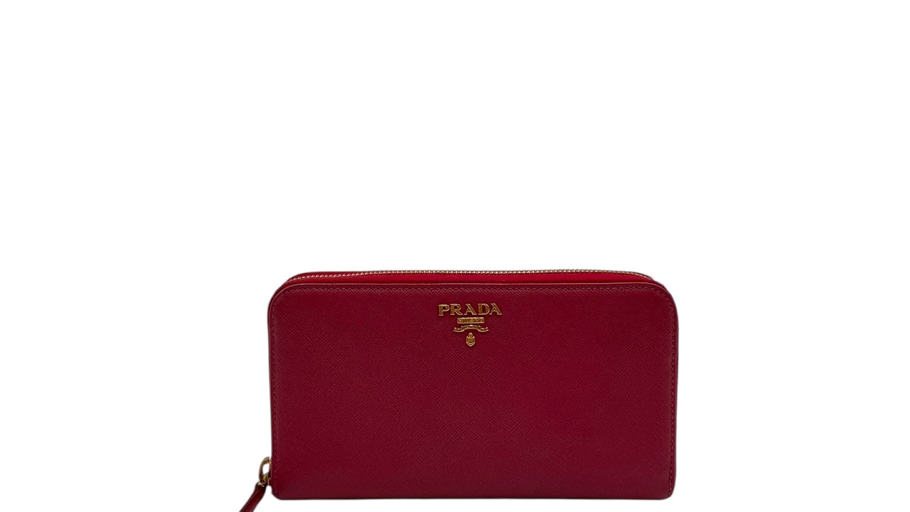 PRADA SAFFIANO LEATHER ZIPPY WALLET IN DEEP PINK