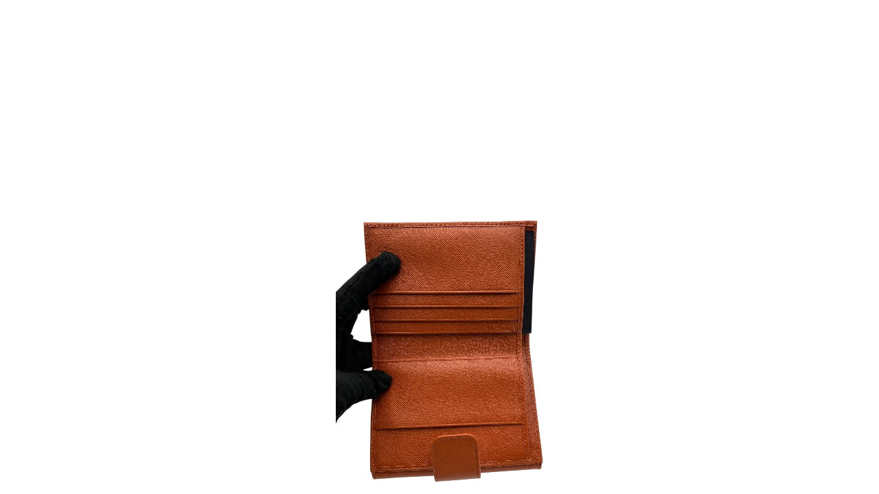 PRADA SAFFIANO LEATHER SHORT WALLET IN PUMPKIN SPICE