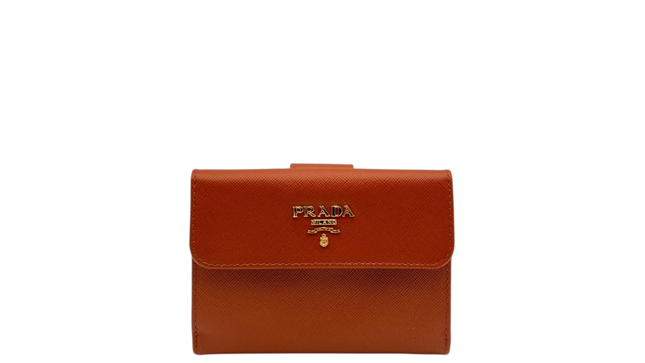 PRADA SAFFIANO LEATHER SHORT WALLET IN PUMPKIN SPICE