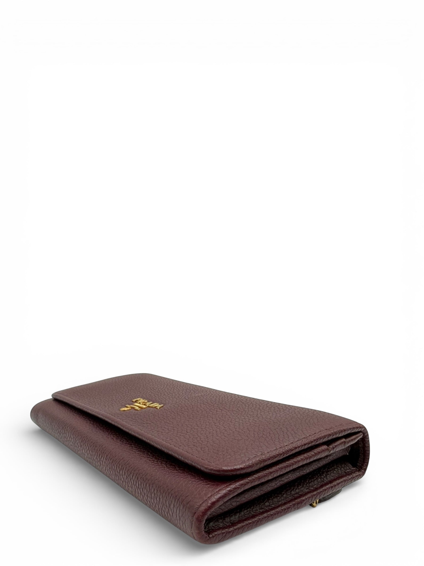 PRADA SAFFIANO METAL CONTINENTAL FLAP WALLET BURGUNDY