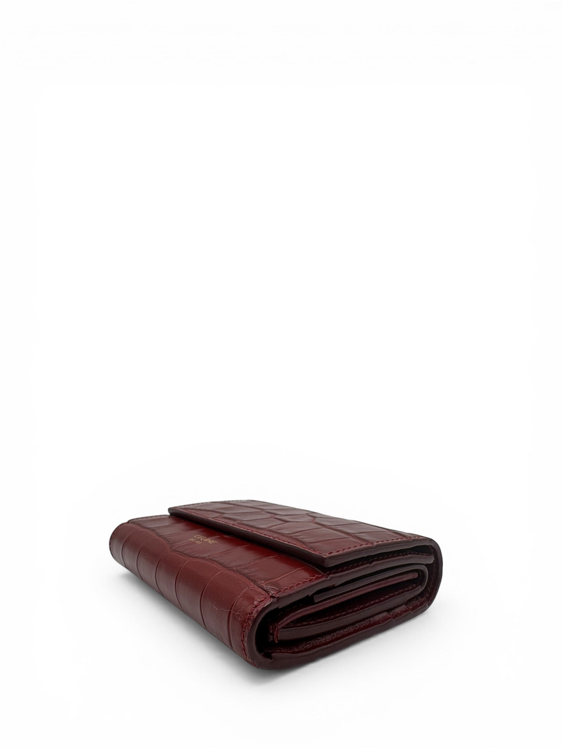 CELINE CROC EMBOSSED BURGUNDY COMPACT WALLET
