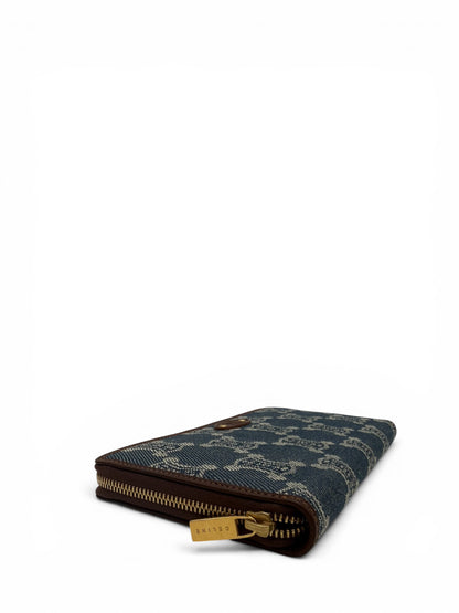 CELINE MACADAM BLUE MONOGRAM JACQUARD DENIM WITH BROWN LEATHER TRIM.