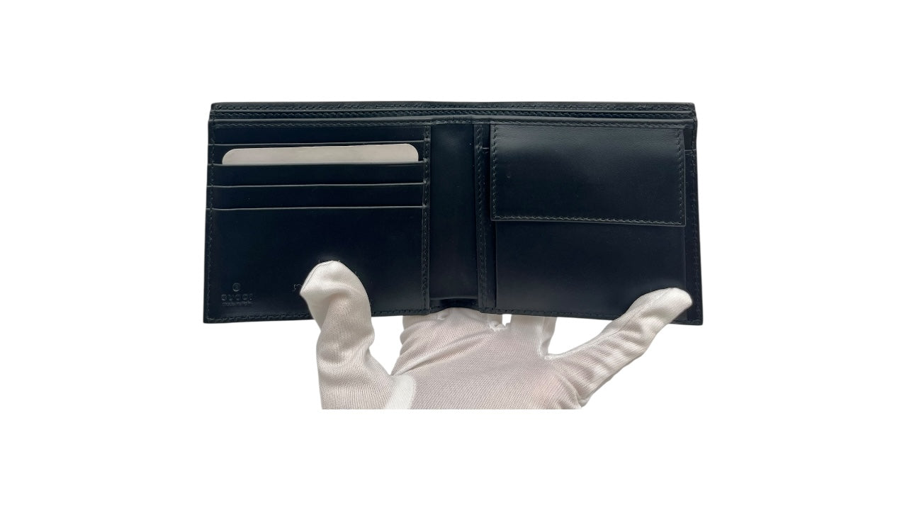 GUCCI GG GUCCISSIMA EMBOSSED COMPACT CANVAS WALLET BLACK