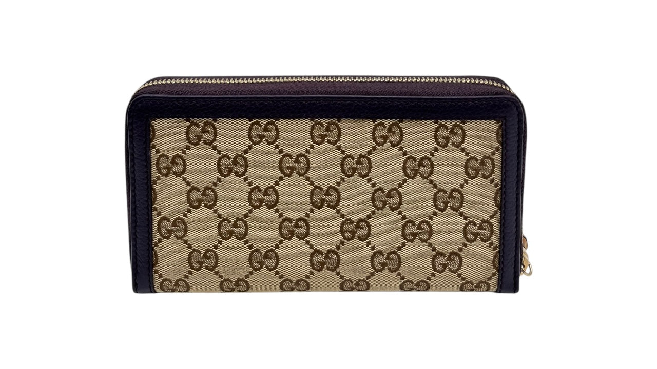 GUCCI GG CANVAS ZIPPY LONG WALLET WITH BAMBOO TASSEL