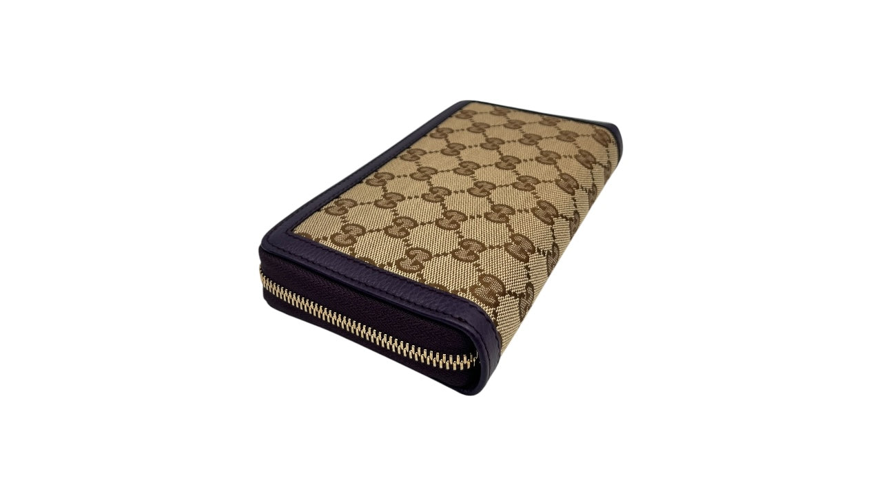 GUCCI GG CANVAS ZIPPY LONG WALLET WITH BAMBOO TASSEL