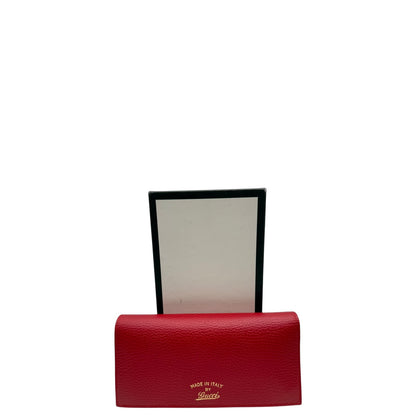 GUCCI PEBBLED LONG CONTINENTAL RED WALLET