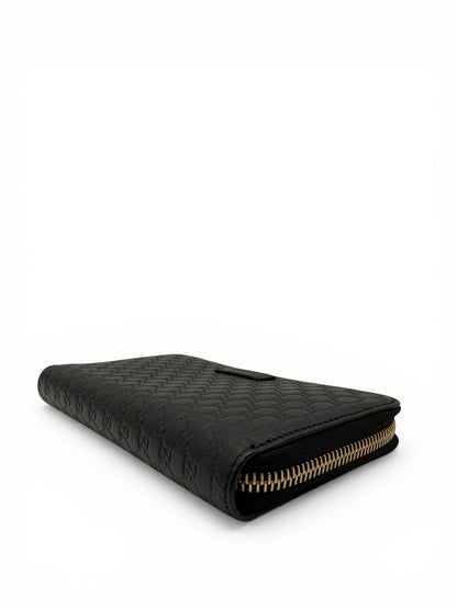 GUCCI MICROGUCCISSIMA ZIP-AROUND WALLET – BLACK