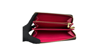 LOUIS VUITTON MONOGRAM SUMMER TRUNKS ZIPPY WALLET