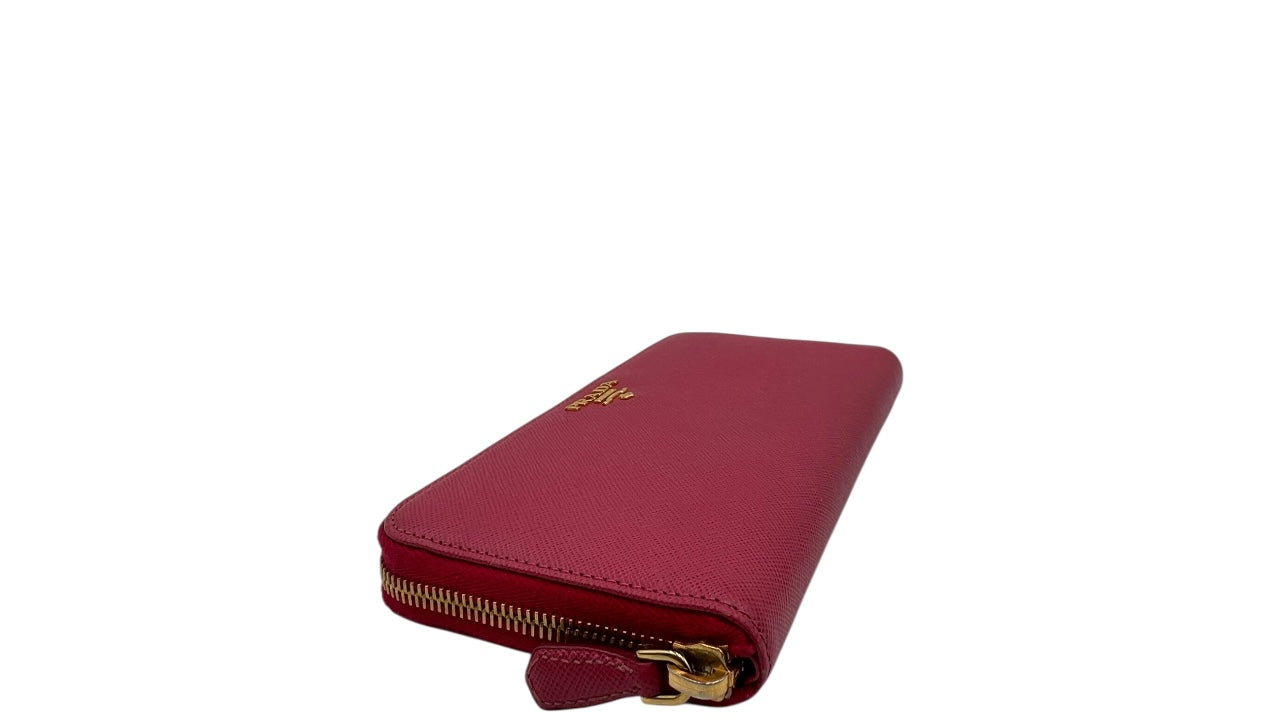 PRADA SAFFIANO LEATHER ZIPPY WALLET IN DEEP PINK