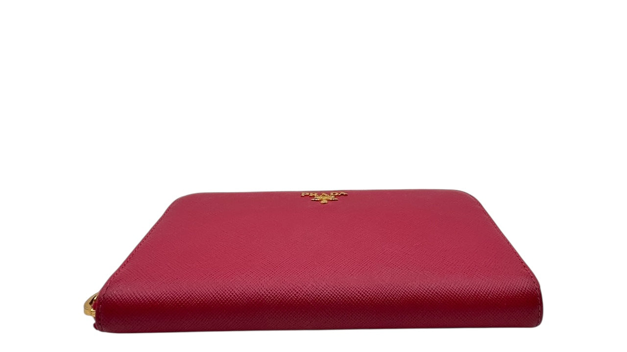 PRADA SAFFIANO LEATHER ZIPPY WALLET IN DEEP PINK