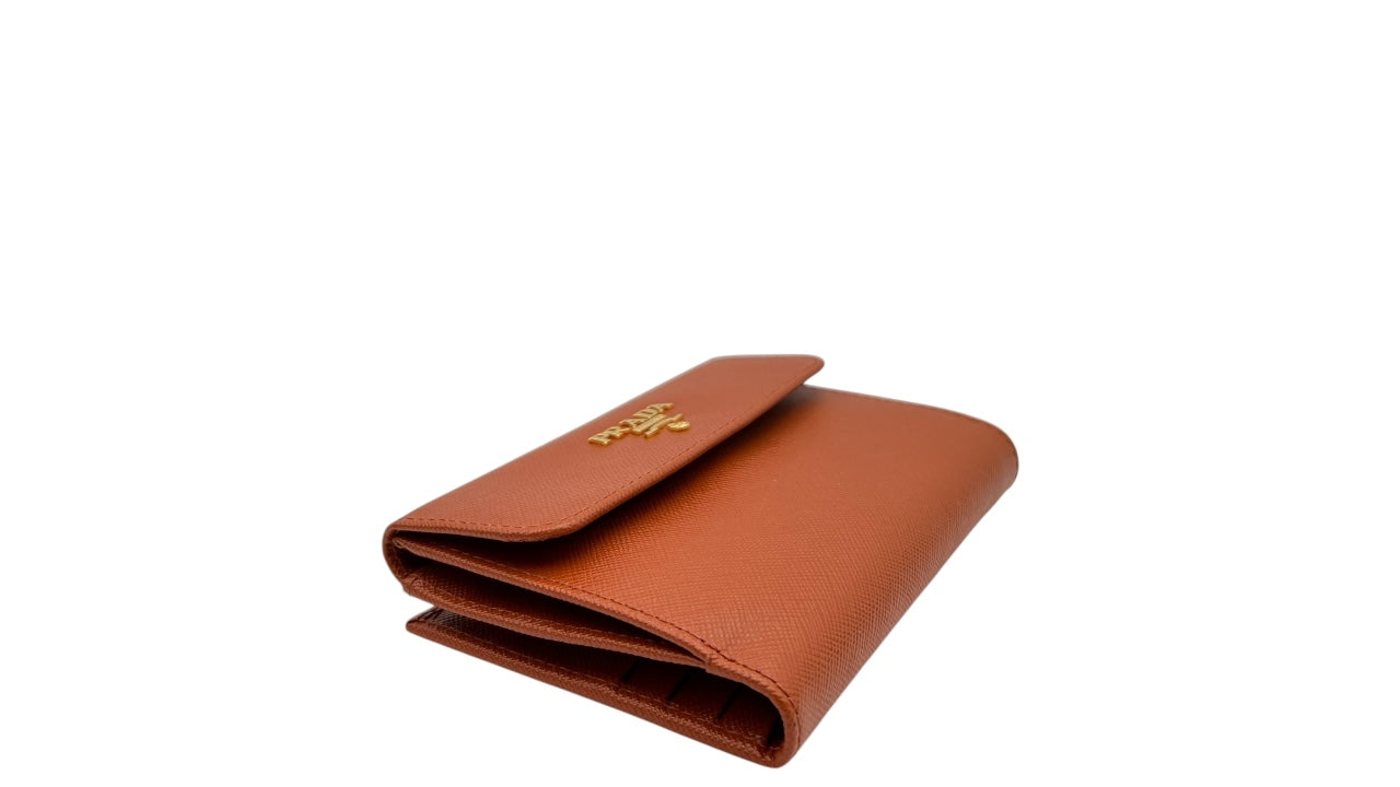 PRADA SAFFIANO LEATHER SHORT WALLET IN PUMPKIN SPICE