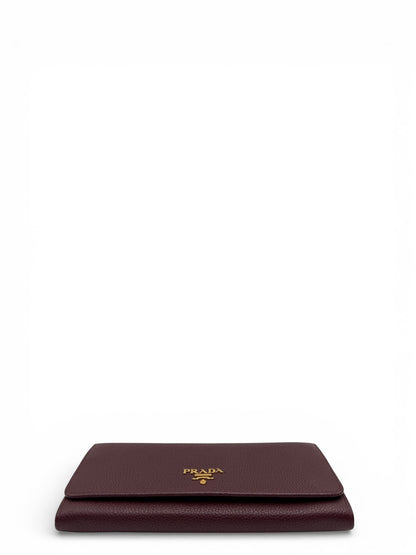 PRADA SAFFIANO METAL CONTINENTAL FLAP WALLET BURGUNDY