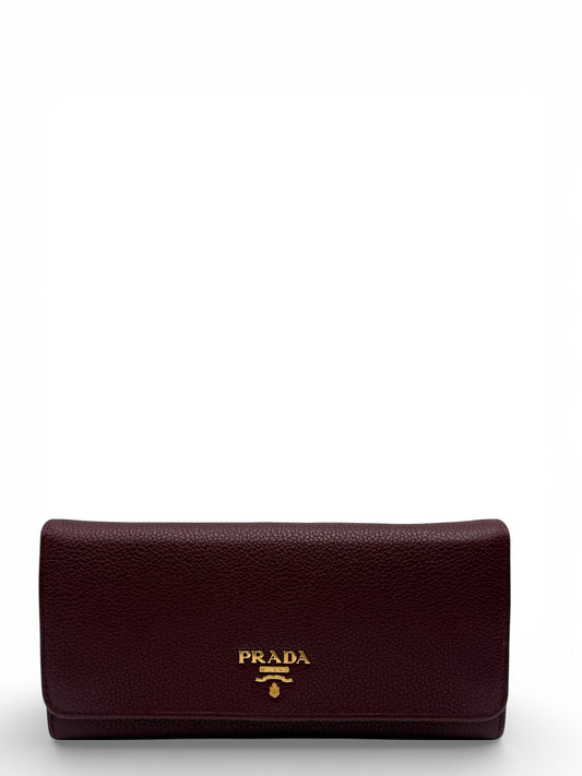 PRADA SAFFIANO METAL CONTINENTAL FLAP WALLET BURGUNDY